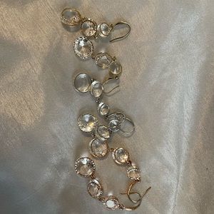 Three pairs of dangle earrings. Silver tone, gold tone, and rose gold tone.